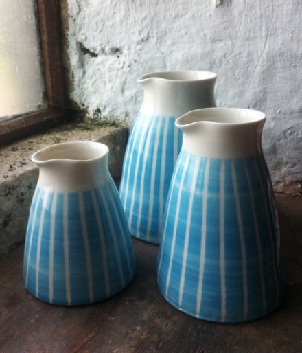 Porcelain stripy handleless jugs £36, Suzanne's Pottery
